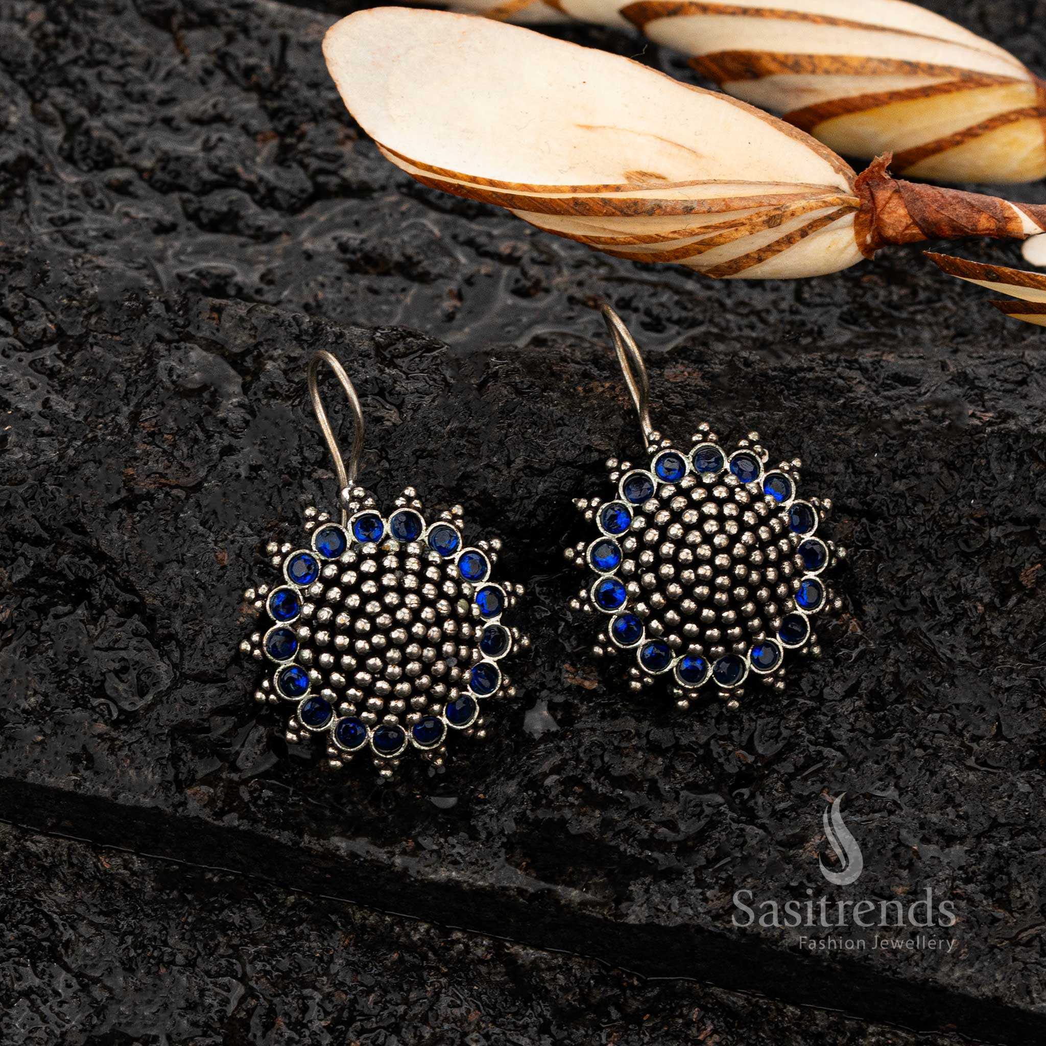 Close-up of oxidised silver earrings with Blue stones - Sasitrends