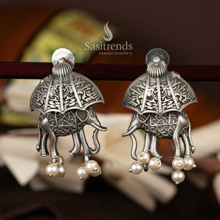 Oxidised silver earrings with elephant motif and pearl accents - Sasitrends