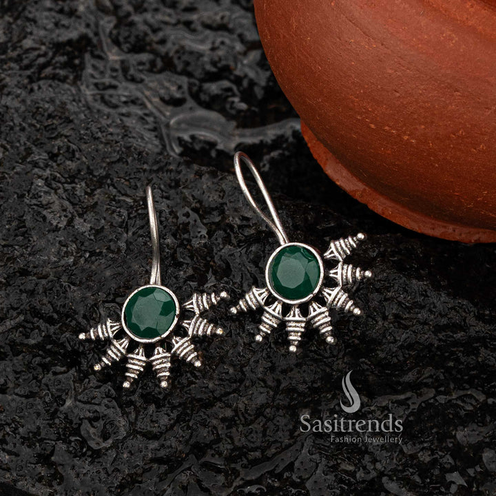 Green stone earrings in oxidised silver with unique motif design - Sasitrends





