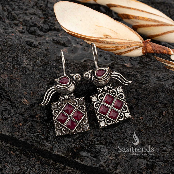 Elegant Ruby stone oxidised earrings with parrot motifs - Sasitrends