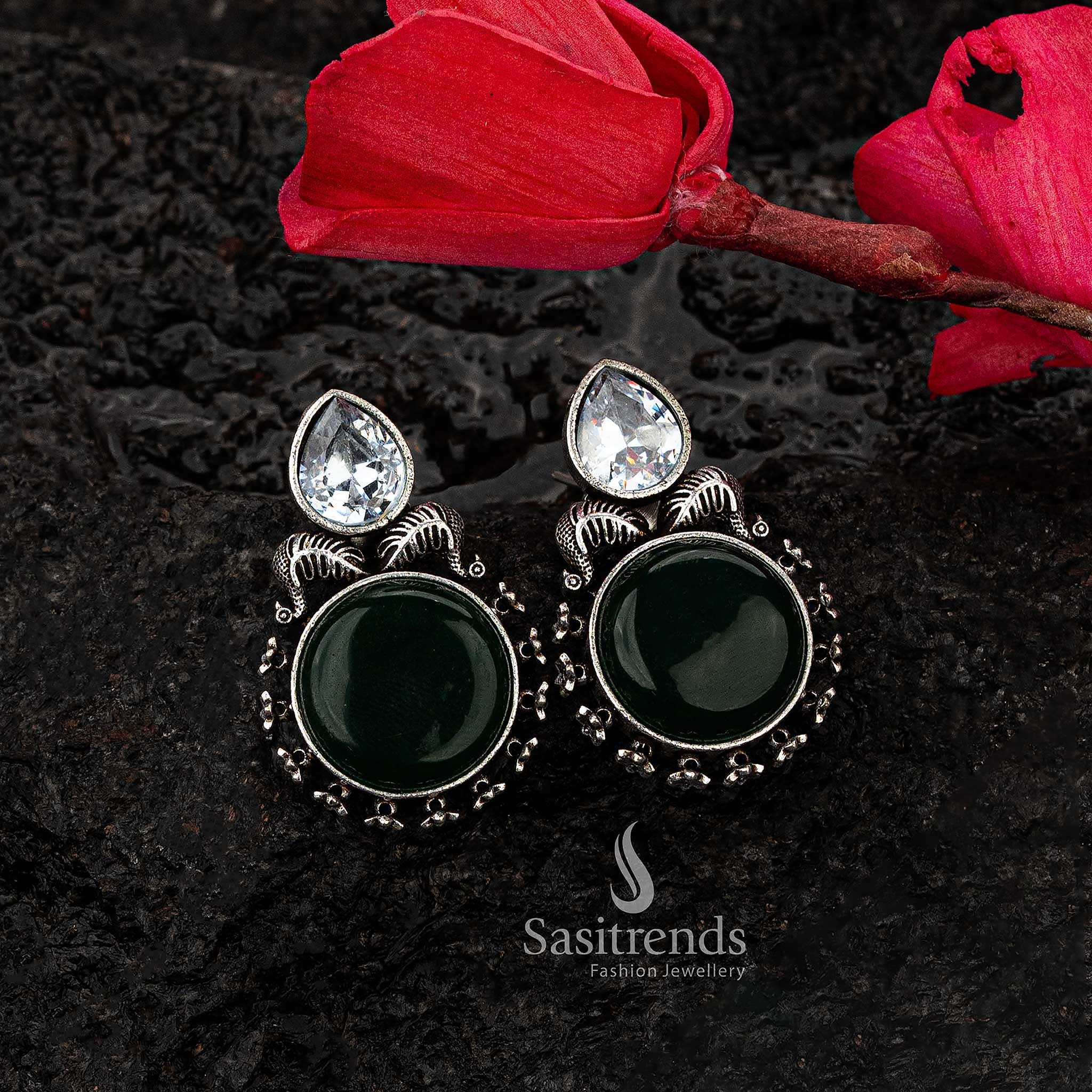 Elegant green Monalisa stone earrings with oxidised silver and CZ accents - Sasitrends





