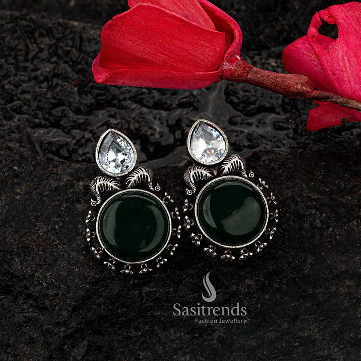 Elegant green Monalisa stone earrings with oxidised silver and CZ accents - Sasitrends





