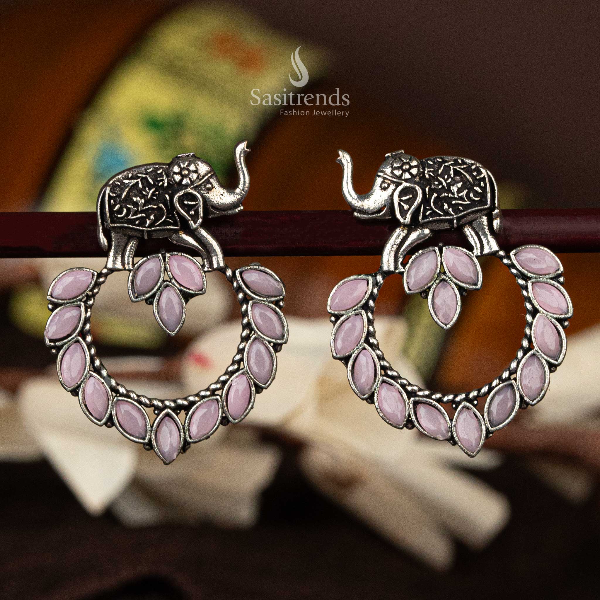 Pink marquise stone oxidised silver earrings with elephant motif - Sasitrends