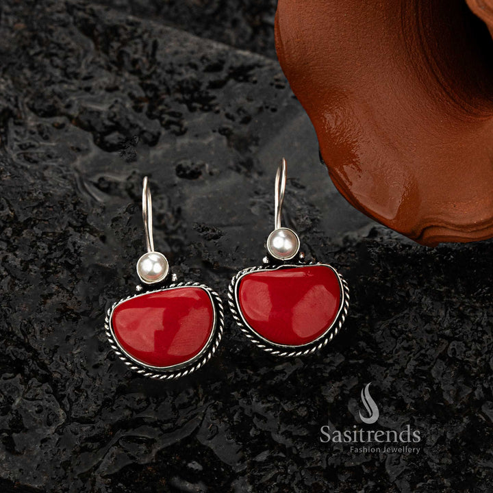 Rustic oxidised silver earrings with red stone and pearl embellishment - Sasitrends