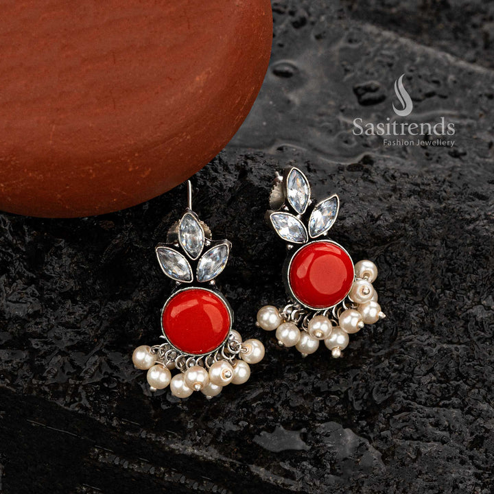 Bold red oxidised earrings with round stone and pearl accents - Sasitrends