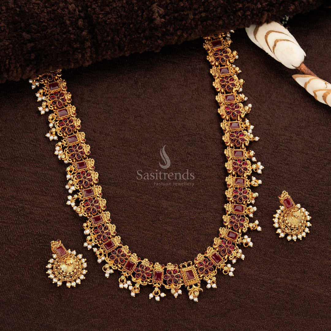 Traditional Ruby long temple haram with matching jhumka earrings adorned with pearls - Sasitrends