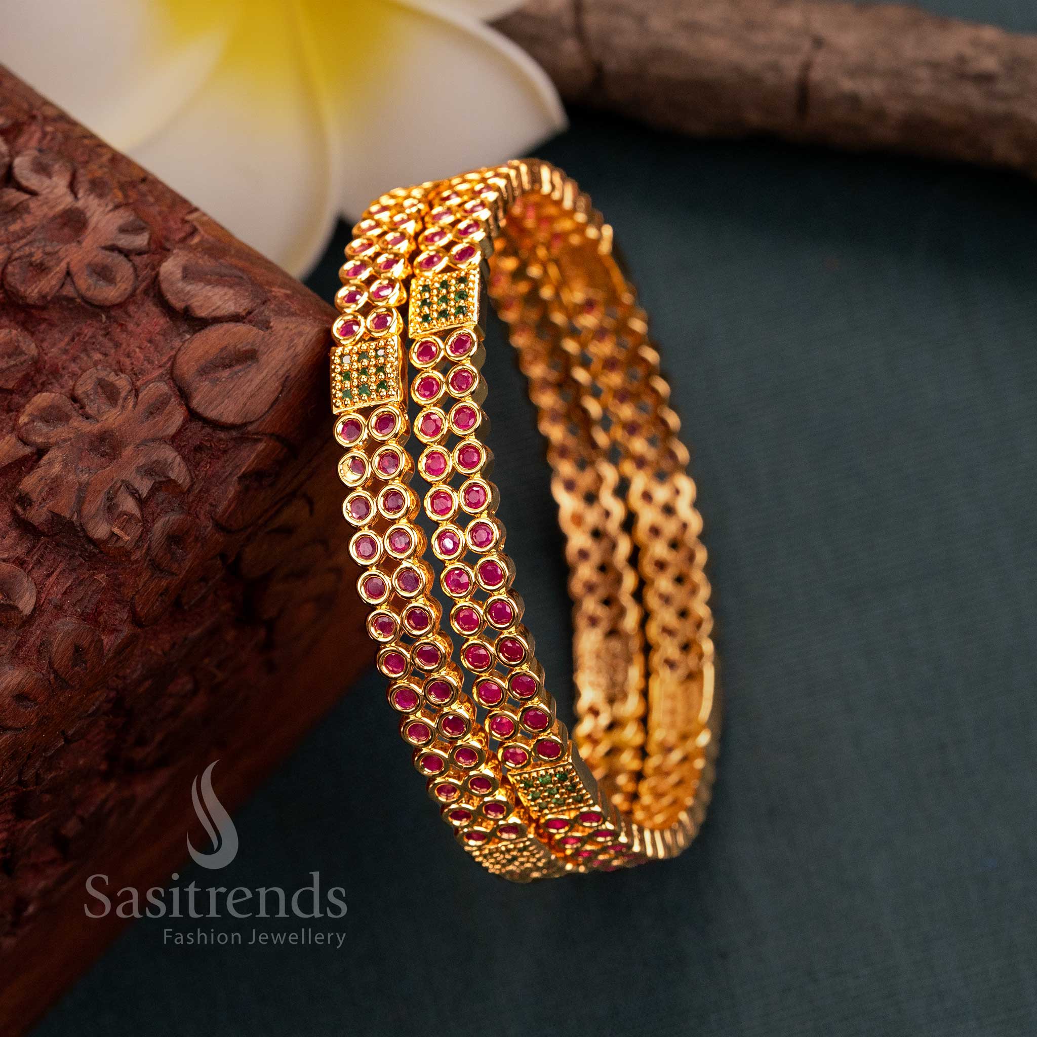 Stunning micro gold-plated ruby-green American diamond bangles, designed for traditional women’s wedding and party wear, a premium jewellery piece - Sasitrends