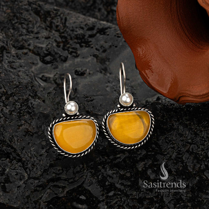 Oxidised silver earrings with yellow stone, perfect for a bold look - Sasitrends