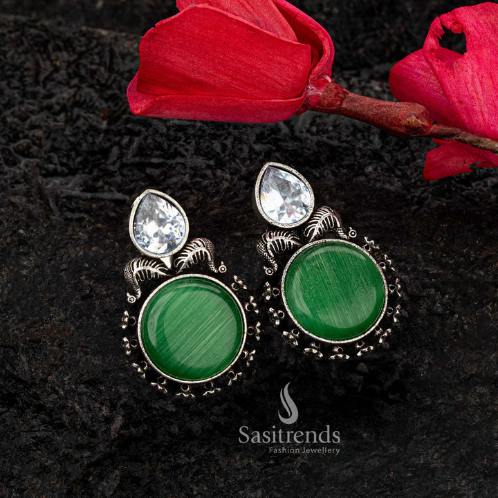 Refreshing light green Monalisa stone earrings with oxidised silver and CZ detail - Sasitrends





