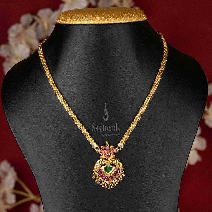 Elegant Kerala Palakka Pendant Necklace with Vibrant Ruby Stones, Peacock Embellishments, and Hanging Gold Balls