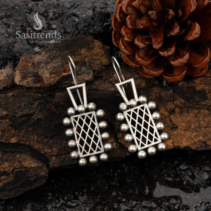 Stunning oxidised earrings featuring geometric motifs and bead accents - Sasitrends