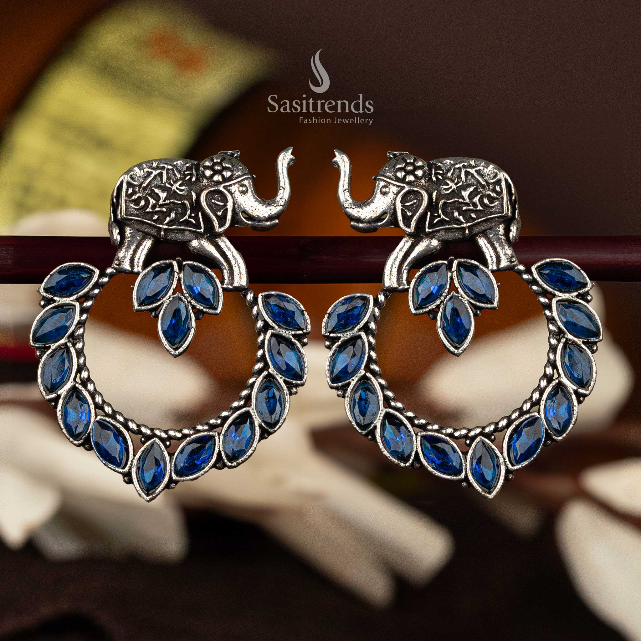 Blue marquise stone oxidised silver earrings with elephant motif - Sasitrends