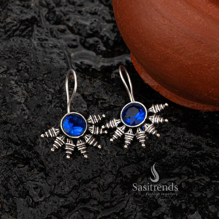 Blue stone oxidised earrings with a traditional motif pattern - Sasitrends