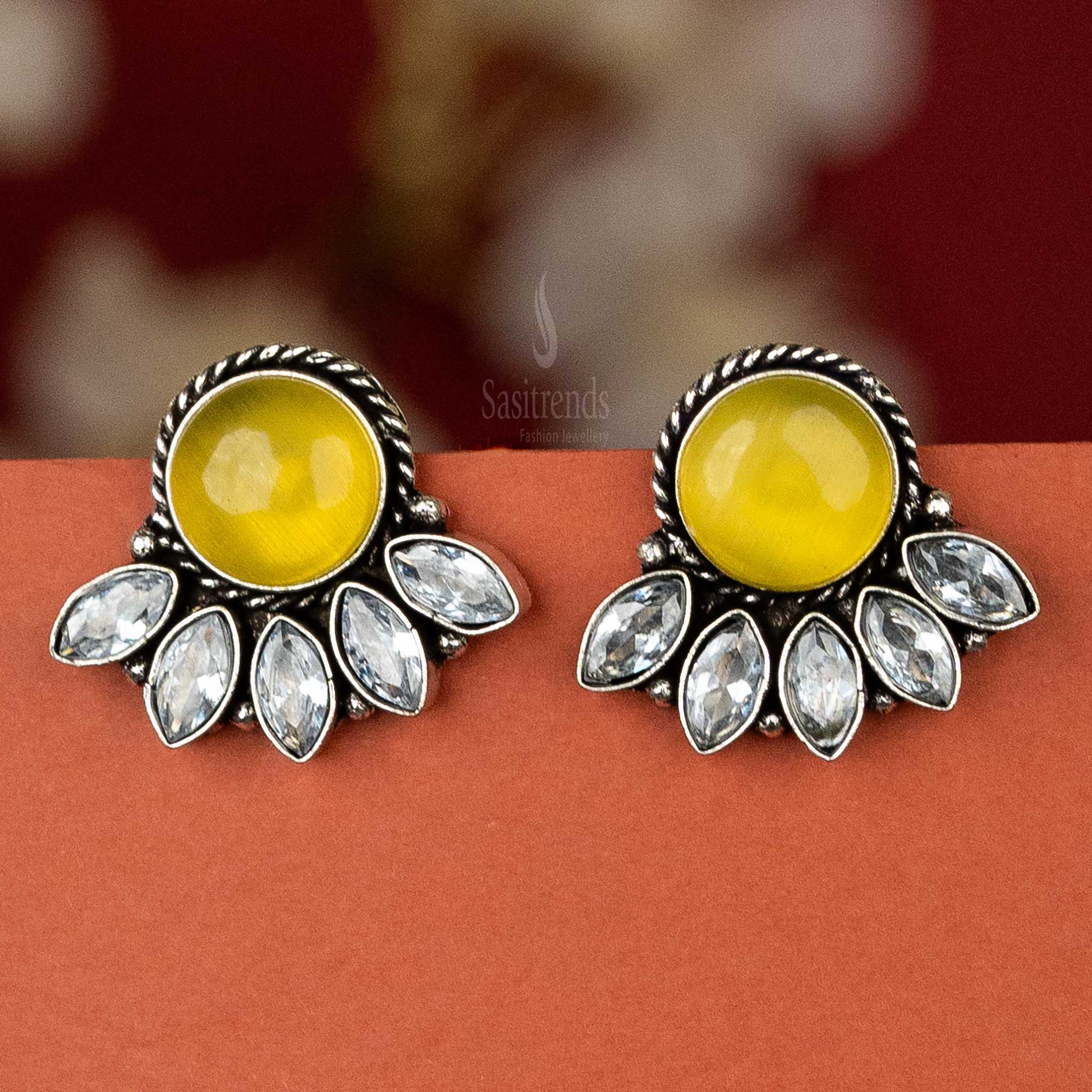 Trendy oxidised silver earrings with yellow cabochon stone and AD stones