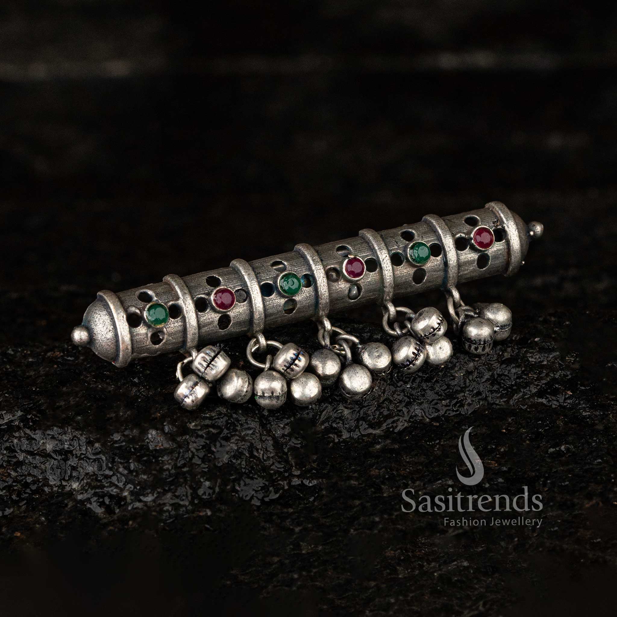 Close-up of oxidised silver ring with vibrant green and red stones - Sasitrends  