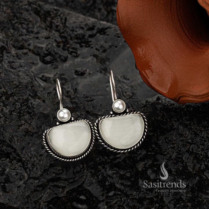 Classic silver-tone earrings with white stone and pearl detailing - Sasitrends