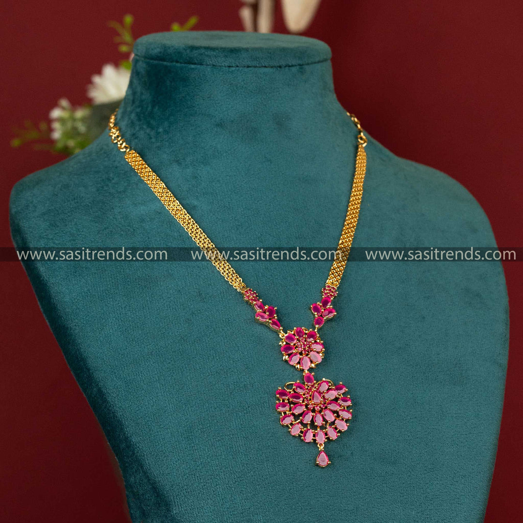 1.	One gram micro gold plated necklace with ruby-green stones