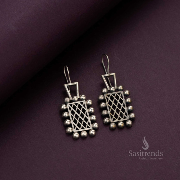 Elegant oxidised earrings featuring geometric motifs and bead accents - Sasitrends