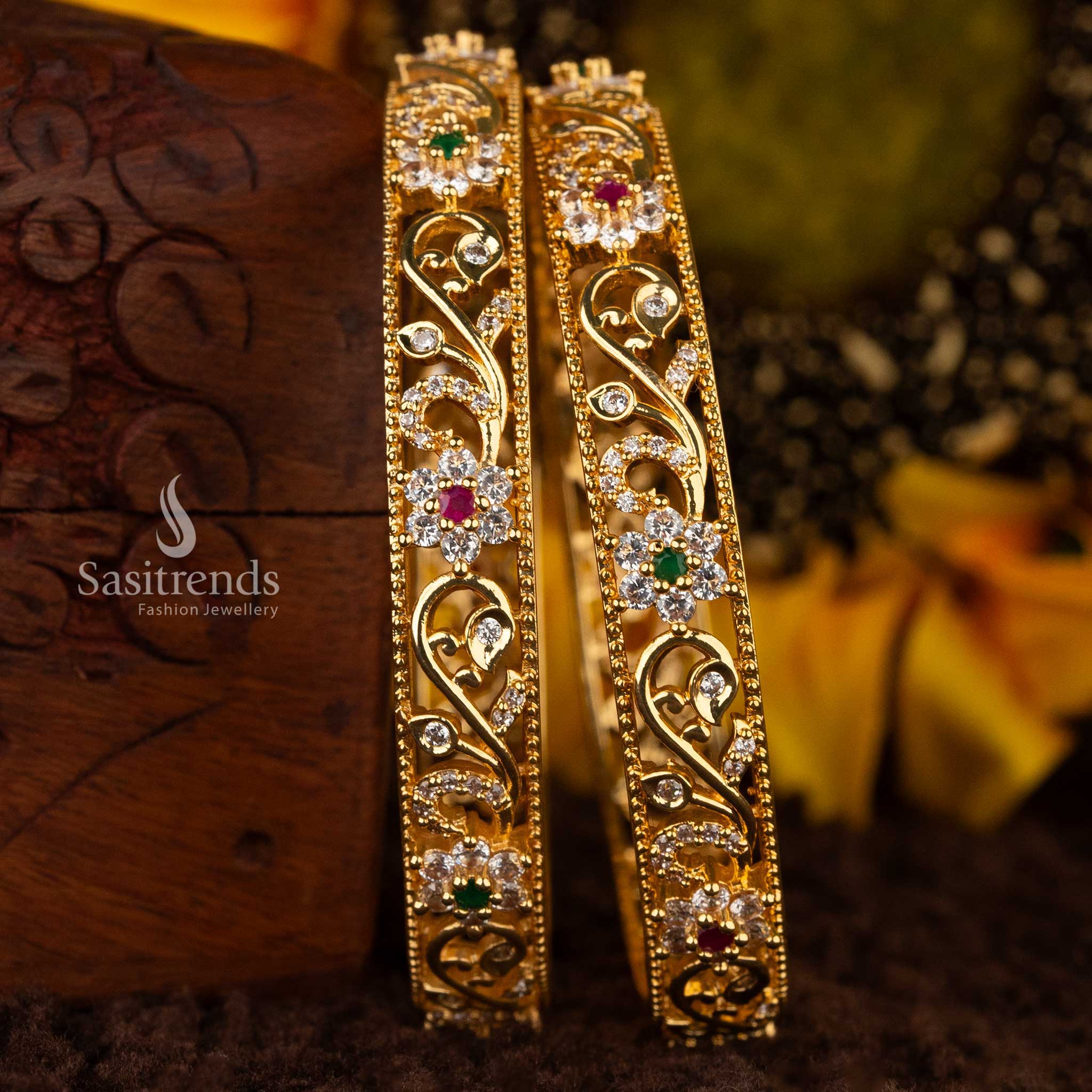 Sophisticated gold-plated floral bangle with intricate design and American Diamonds - Sasitrends