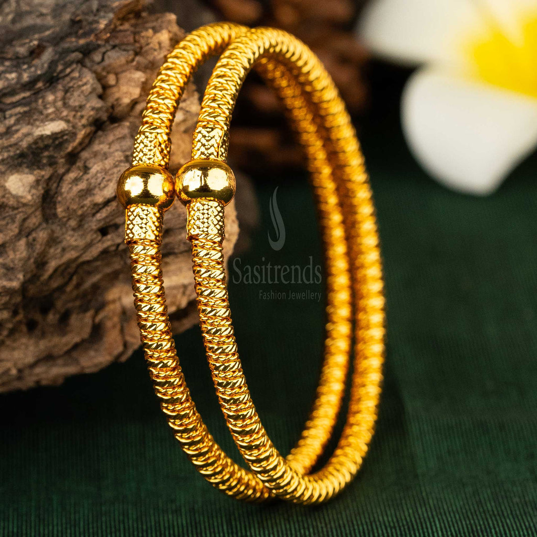 Elegant, twisted rope design gold plated kada bangles for weddings and engagements