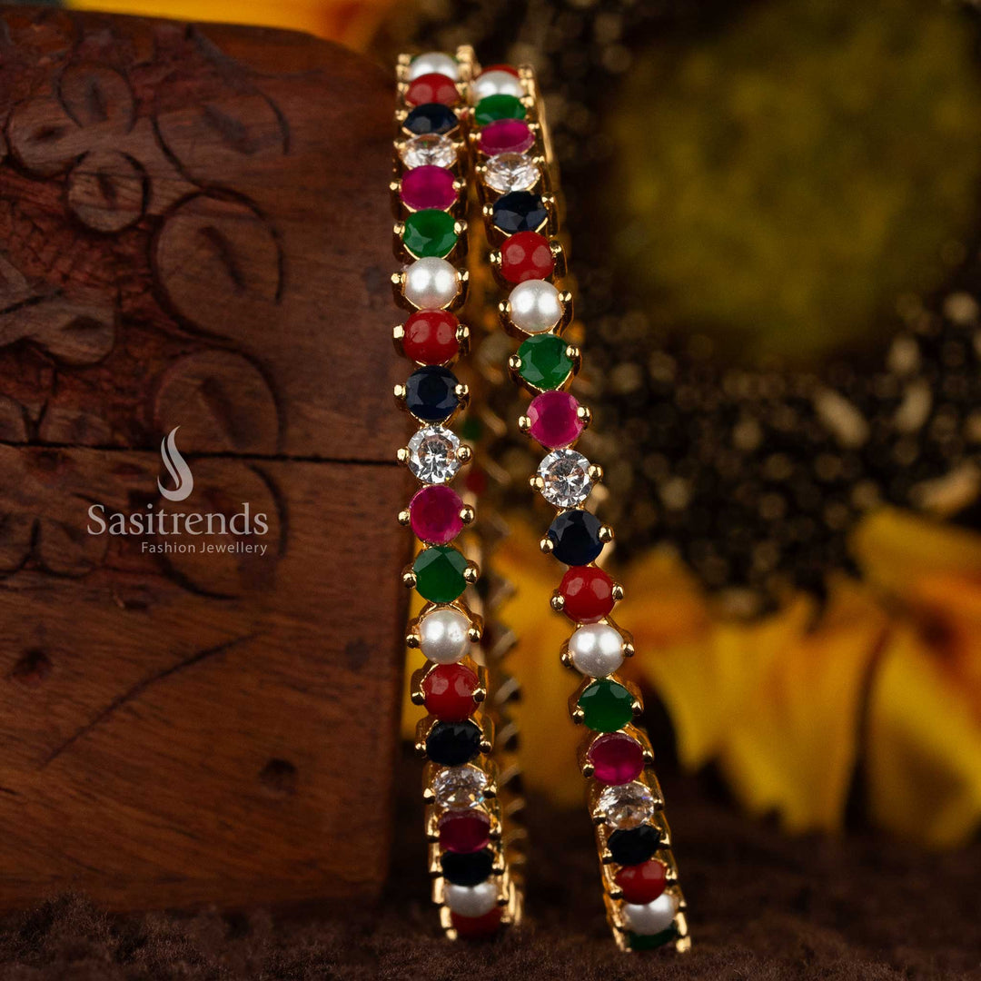 Colorful American Diamond Navaratna bangles with ruby, emerald, pearl, and sapphire stones - Sasitrends