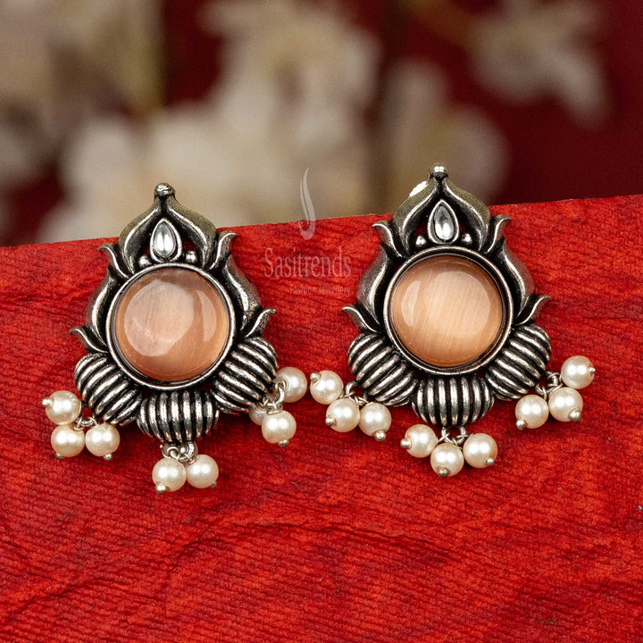 Chic oxidised silver earrings with peach cabochon stone and pearls for visiting friends