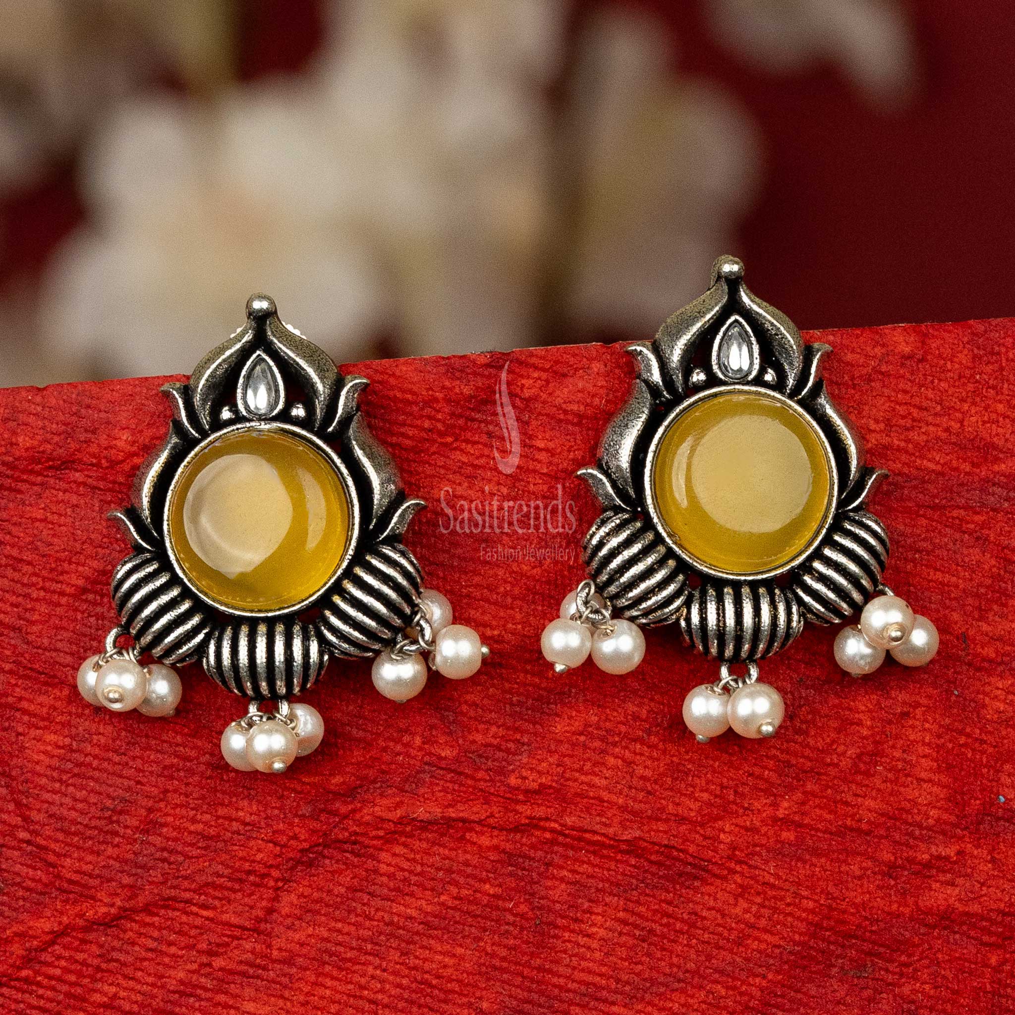 Chic oxidised silver earrings with yellow cabochon stone and pearls for visiting friends