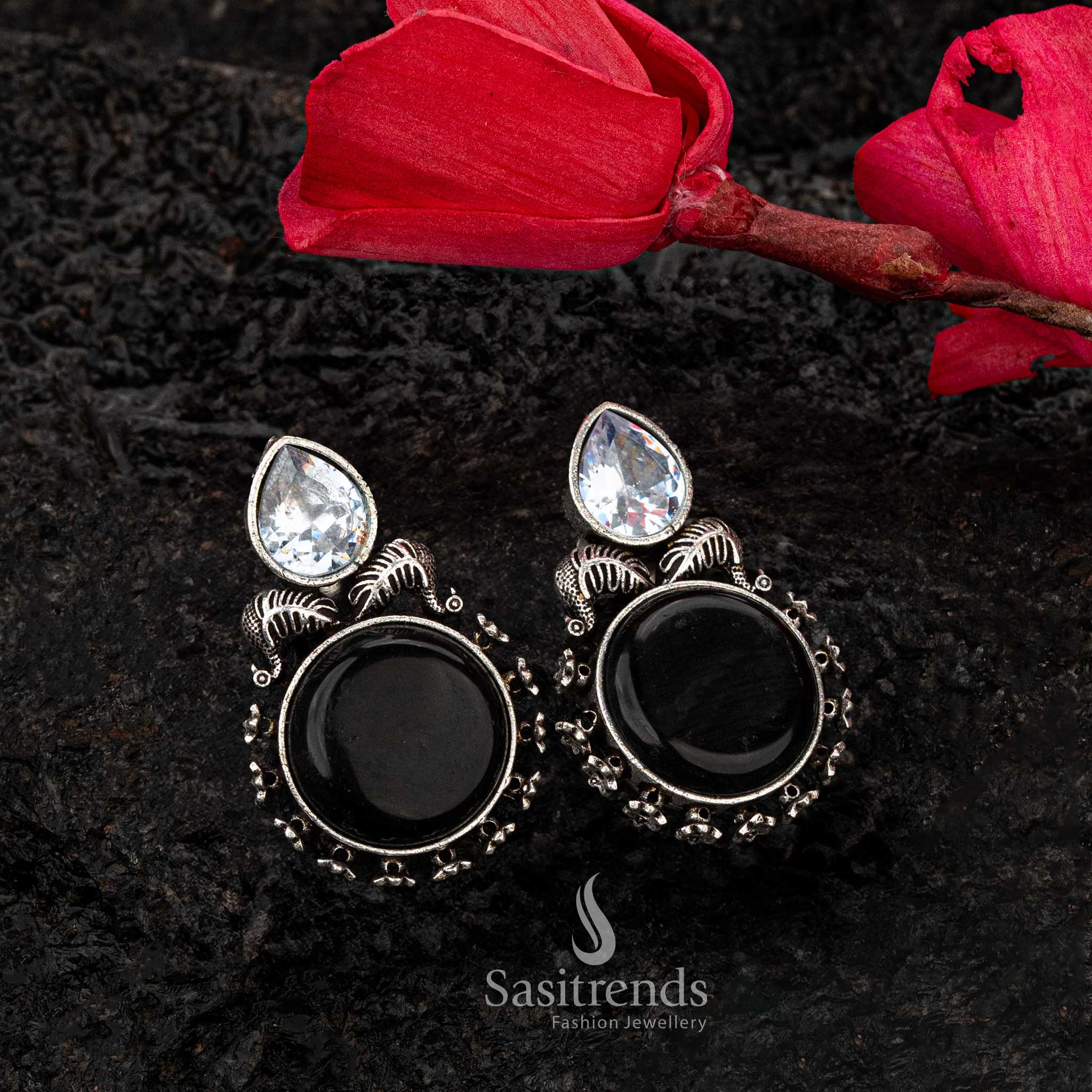 Bold black Monalisa stone earrings with oxidised silver CZ leaf motif - Sasitrends





