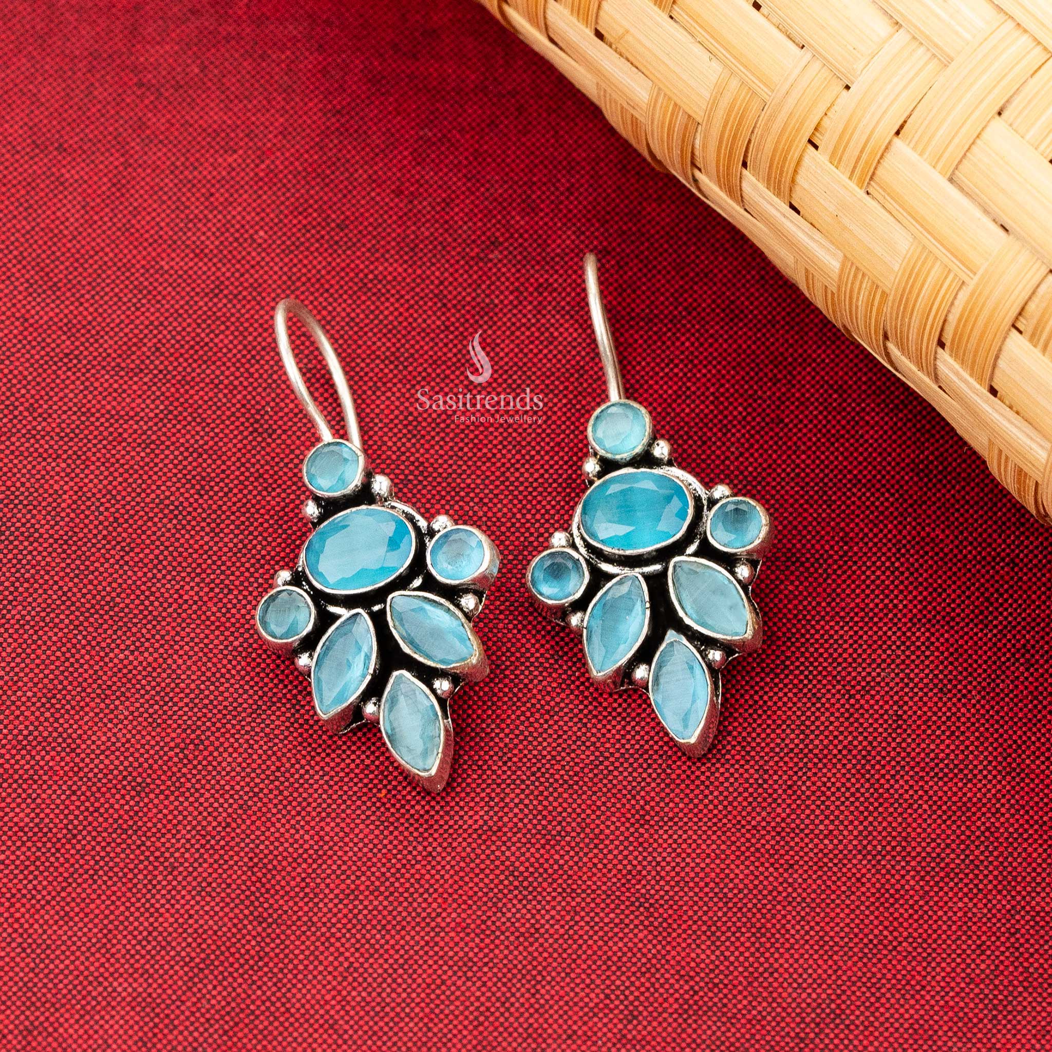 Oxidised Silver Earrings with Sky Blue Stones in a Leaf Pattern