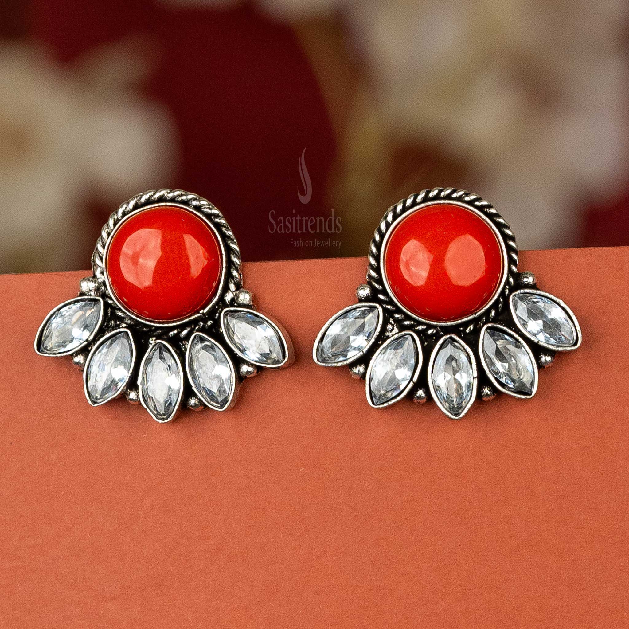 Trendy oxidised silver earrings with red cabochon stone and AD stones