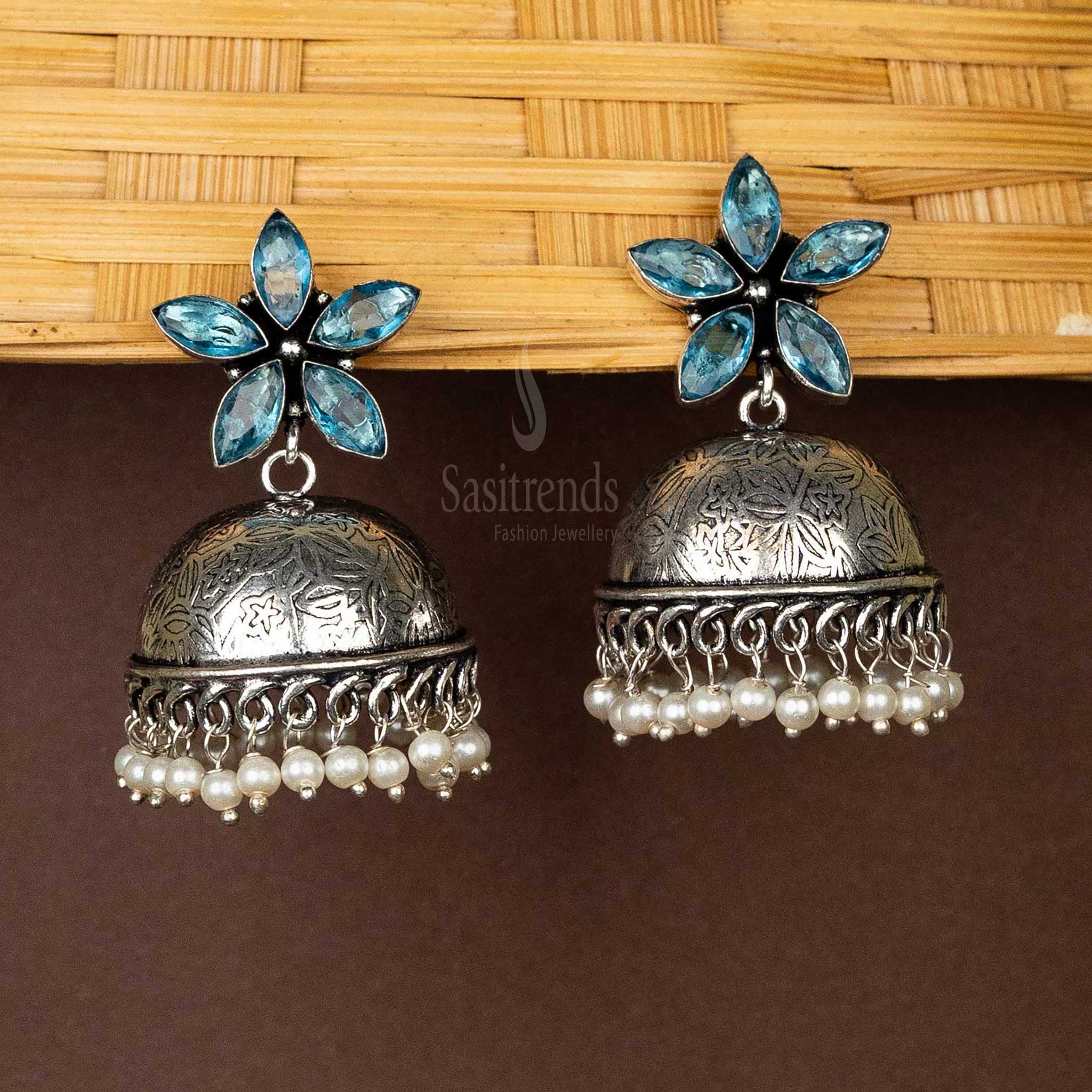 Sky blue-floral-top-jhumka-earrings-with-pearl-hanging