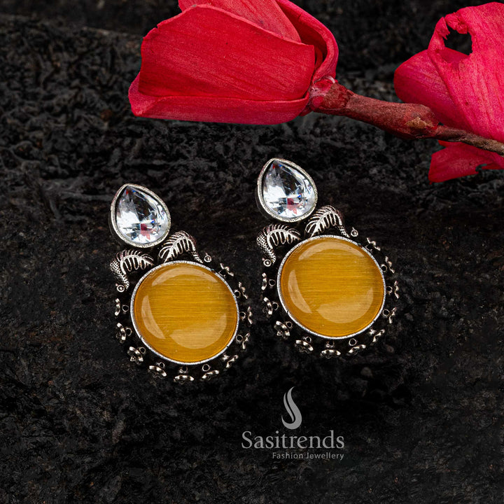 Vibrant yellow Monalisa stone oxidised earrings with CZ leaf design - Sasitrends





