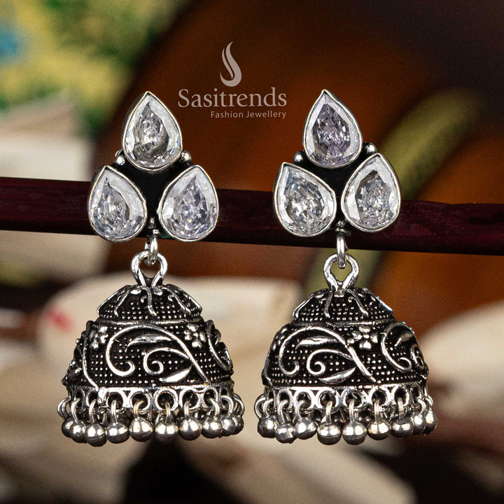 Elegant oxidised floral jhumka earrings with white waterdrop stones and bead detailing - Sasitrends