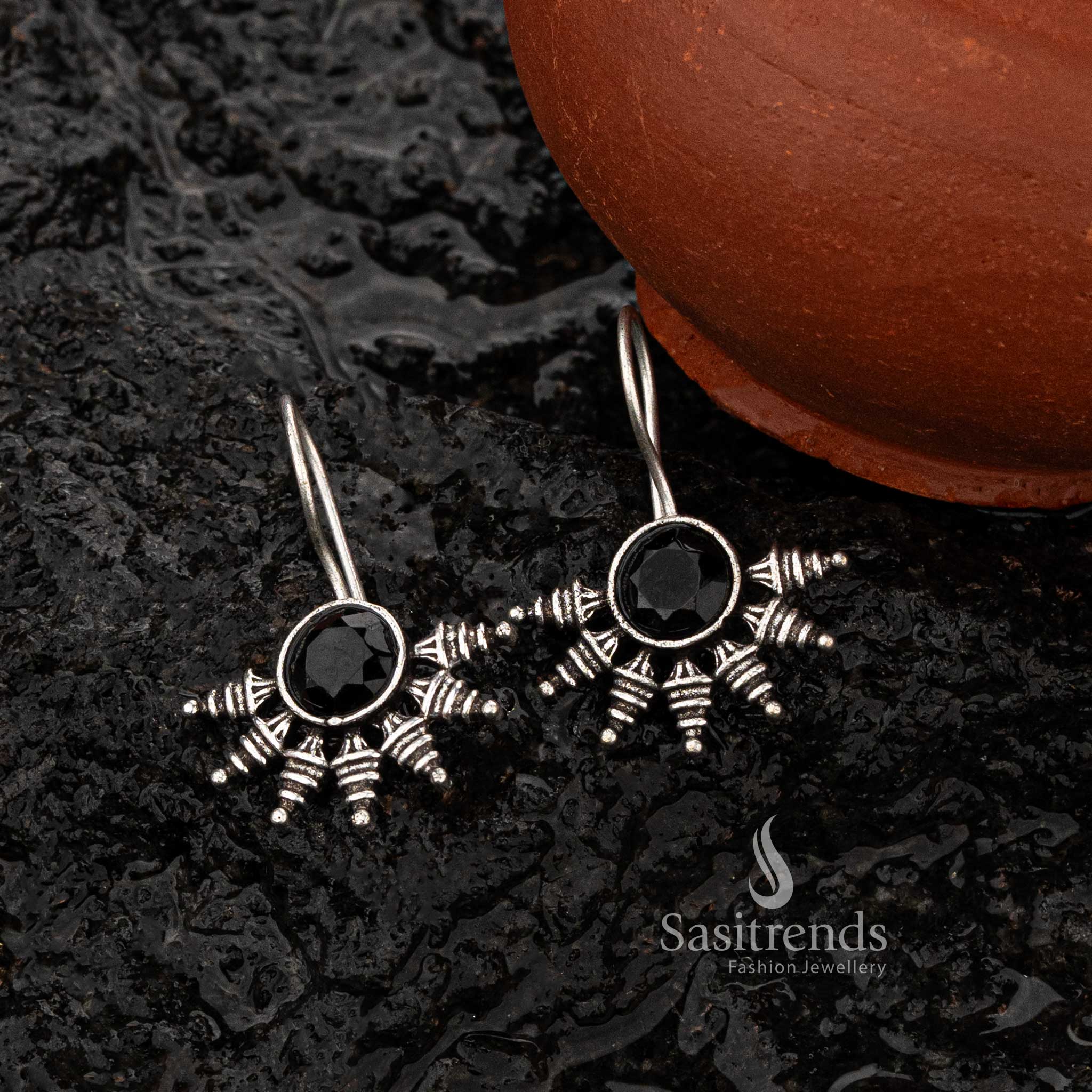 Oxidised silver earrings with black stone and intricate design - Sasitrends