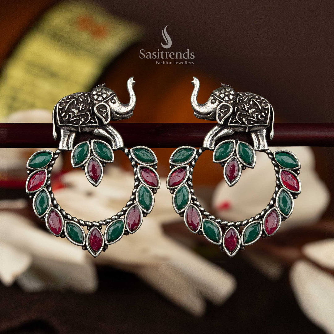 Green and red marquise stone oxidised earrings with elephant design - Sasitrends





