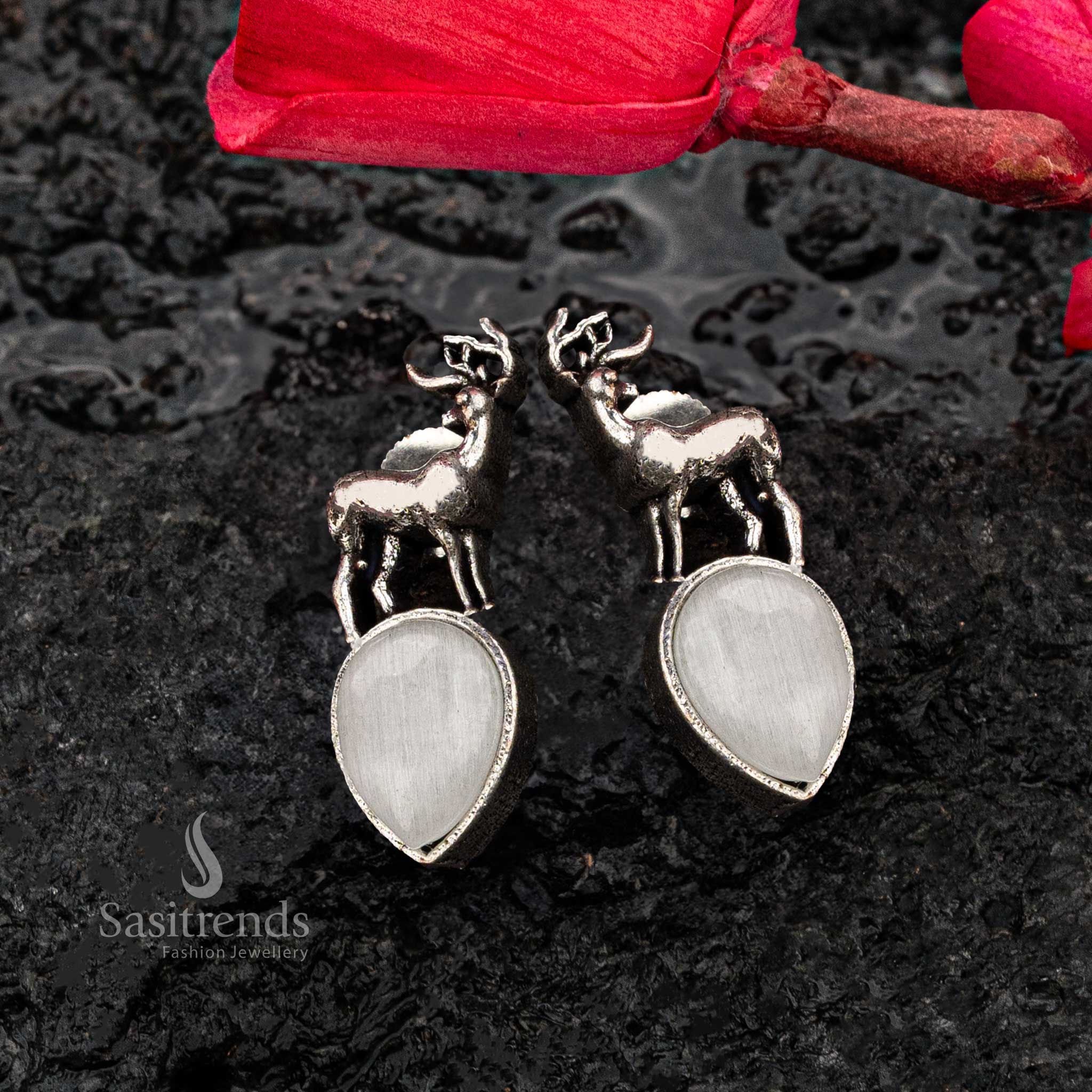 White Monalisa stone oxidised silver earrings with deer - Sasitrends