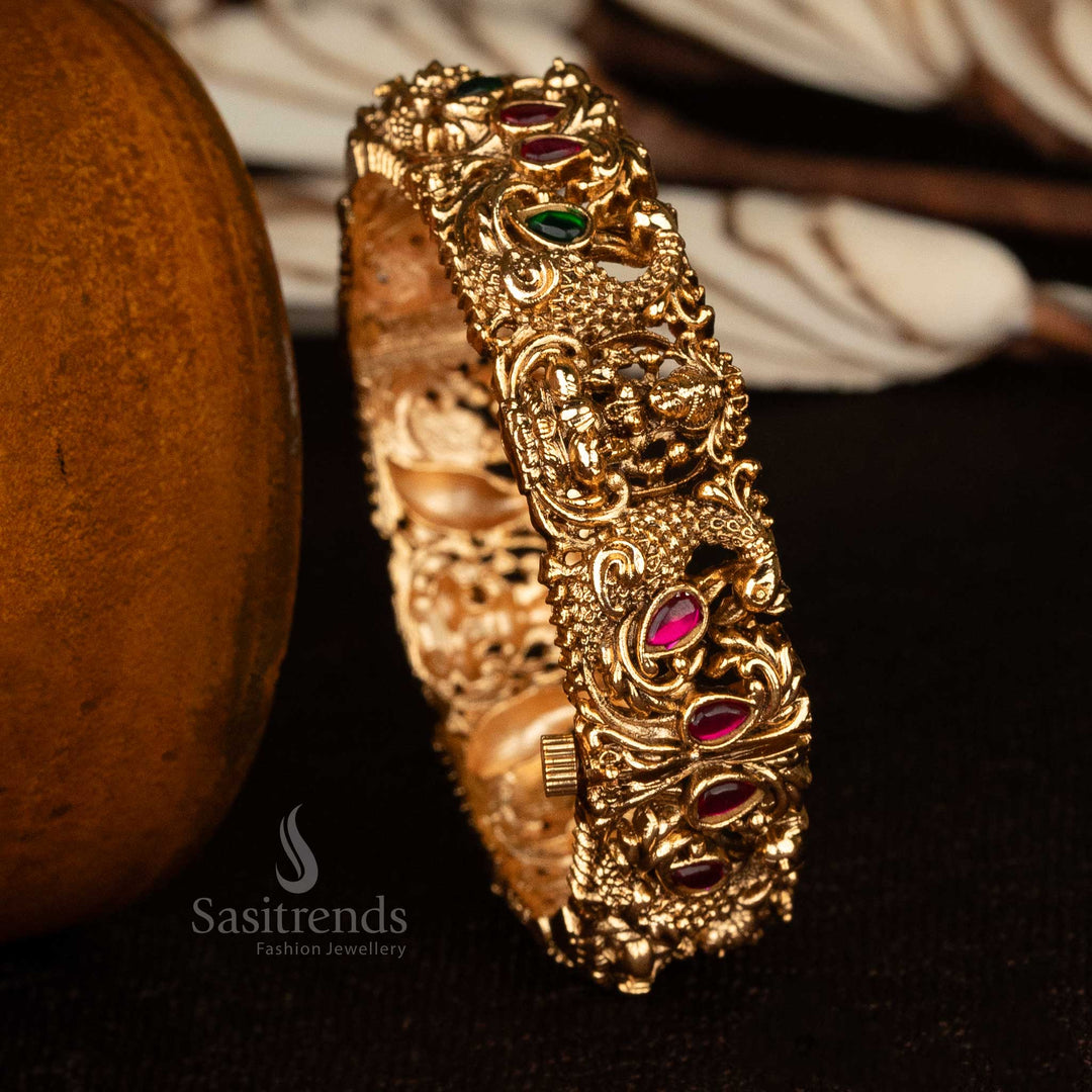 Matte gold-plated screw-type openable temple kada bangle with ruby-green accents - Sasitrends