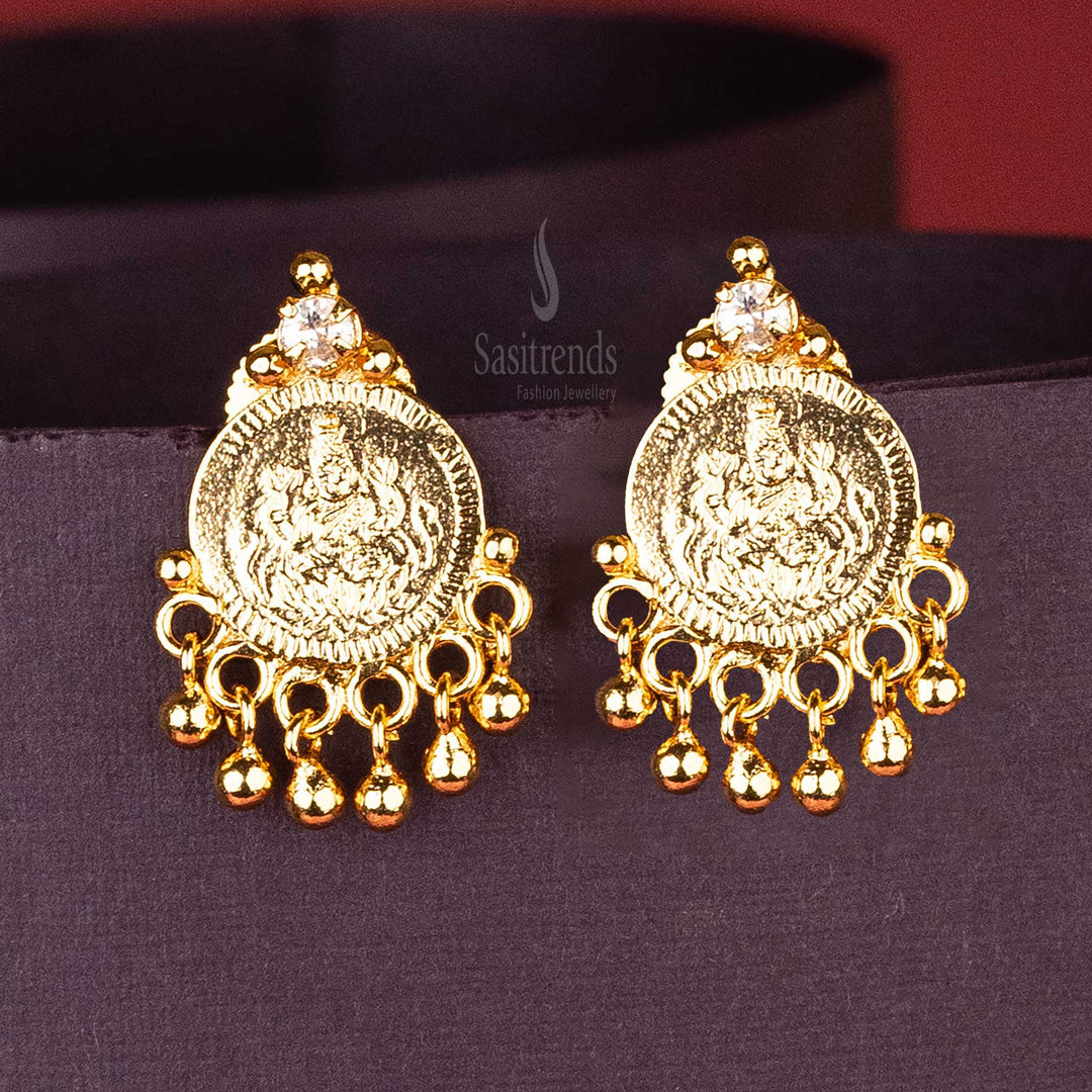 Traditional White Lakshmi Coin Gold Plated Earrings with AD Stone and Hanging Golden Balls – Luxurious Look