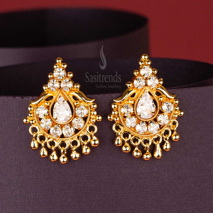 Elegant white AD stone earrings with golden ball hangings