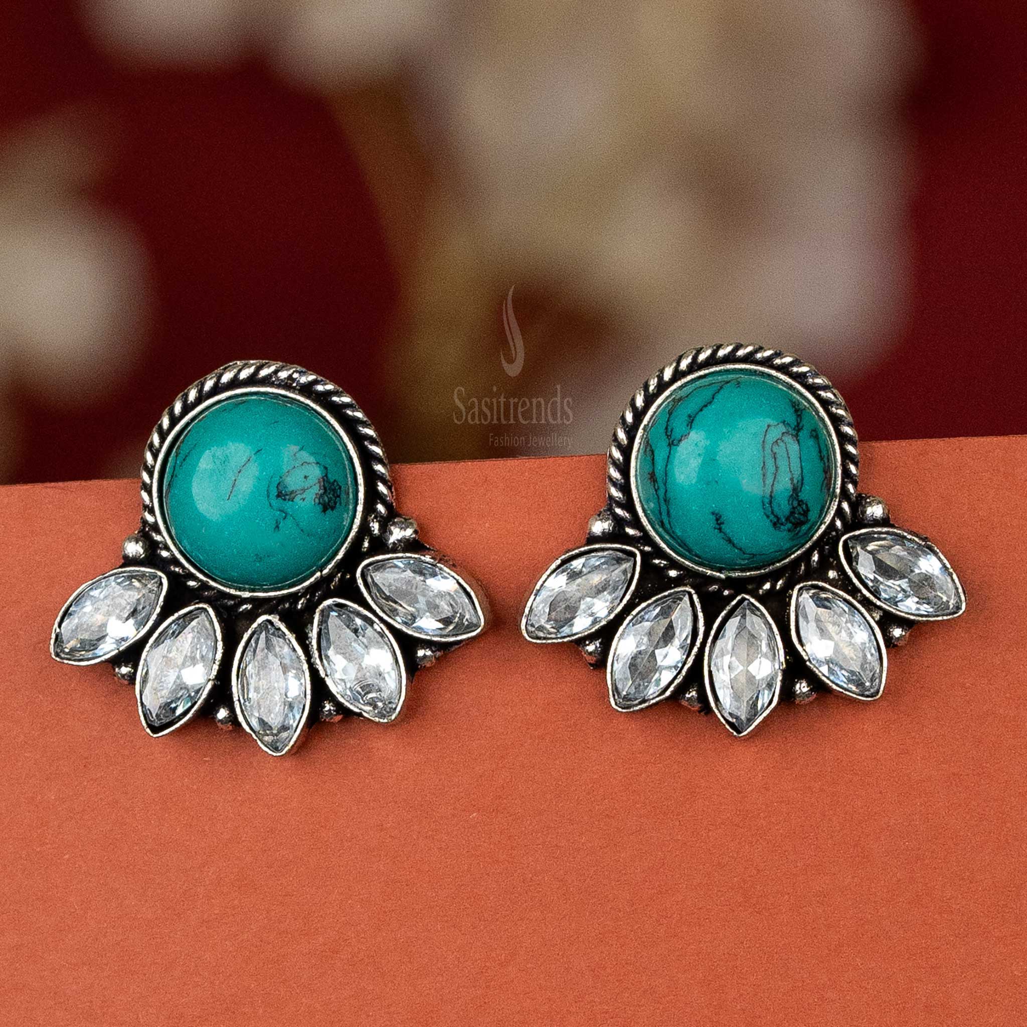 Trendy oxidised silver earrings with turquoise  cabochon stone and AD stones