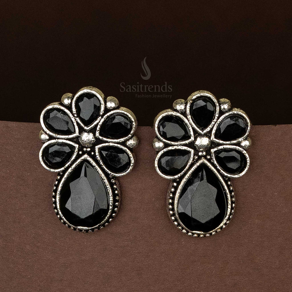 . Elegant oxidised silver earrings for casual outings with black teardrop stone