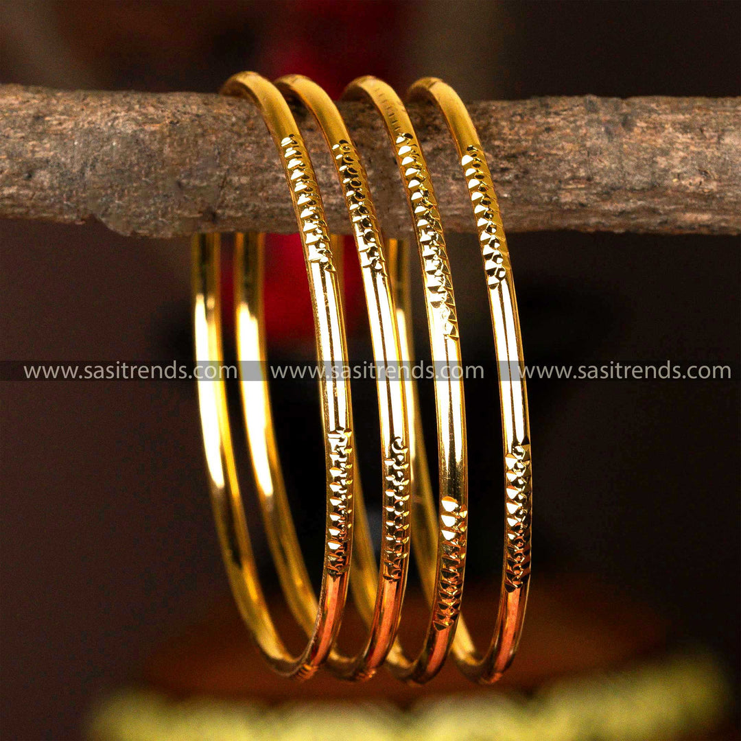 Set of four micro gold-plated kada bangles with intricate textural engravings