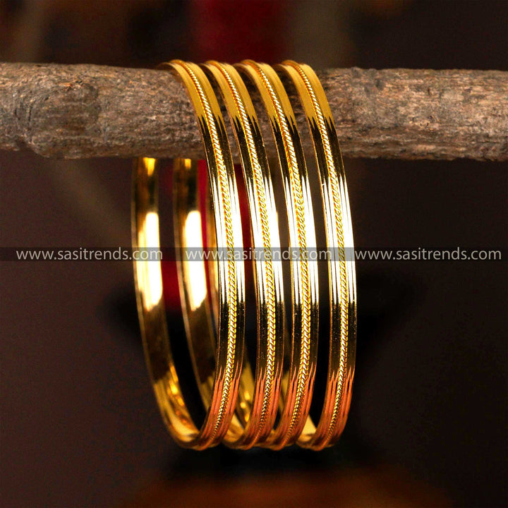 Set of four micro gold-plated kada bangles with detailed texturing for an elegant finish.