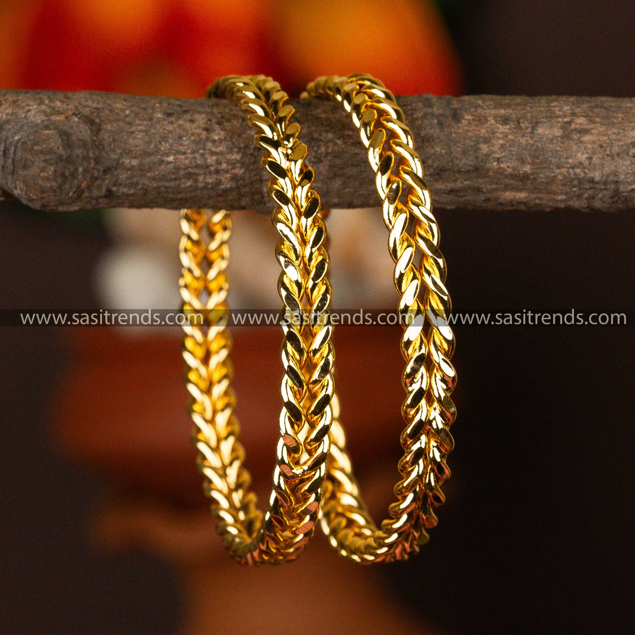 Gleaming twisted rope design micro gold-plated bangles, reflecting traditional elegance