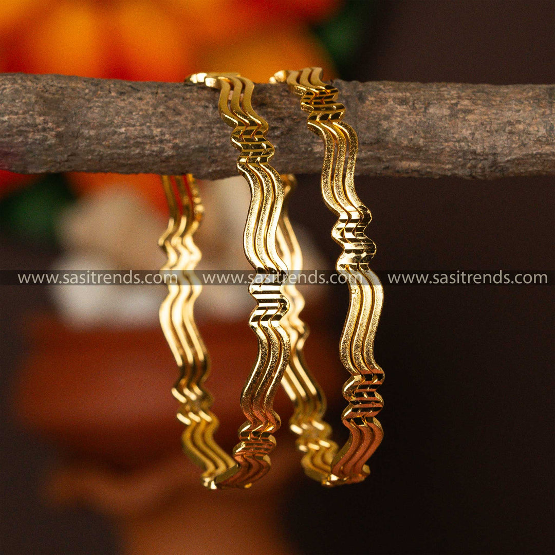 Golden bangles with a serene wave design, plated with micro gold