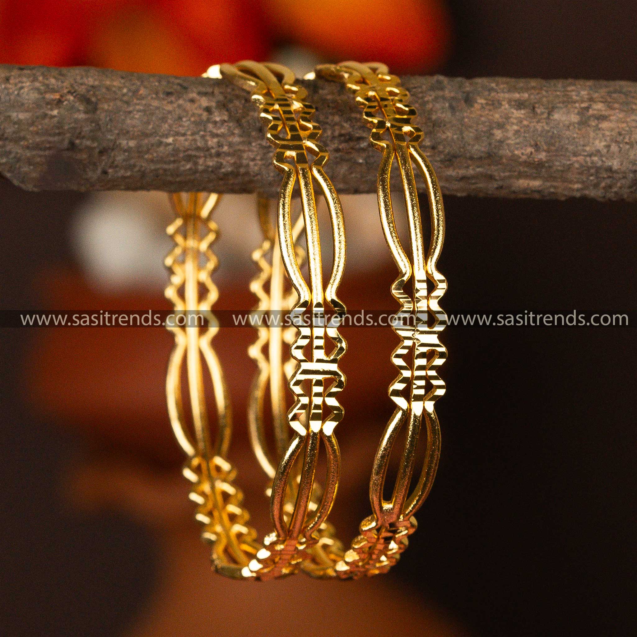 Sculpturally designed micro gold-plated bangles with an artistic twist