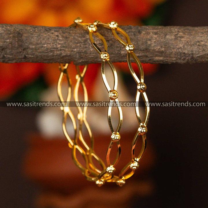 Delicate micro gold-plated bangles featuring an infinity loop design with golden beads