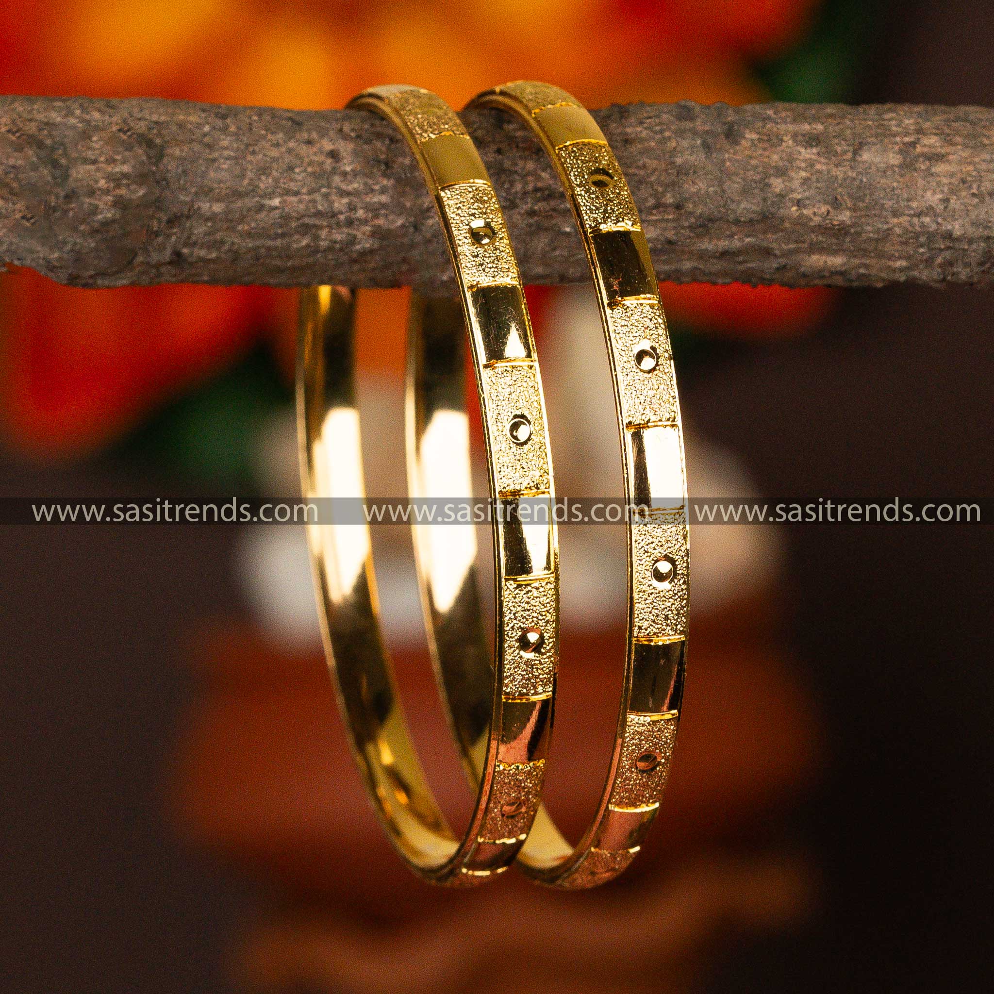 Micro gold-plated bangles with a stellar dotted design for a cosmic touch.