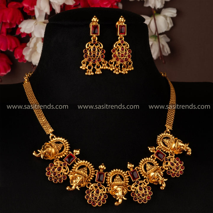 Divine Elegance: Classic Temple Matt Gold Ganesh Pendant Choker Jewellery Set with Matching Earrings