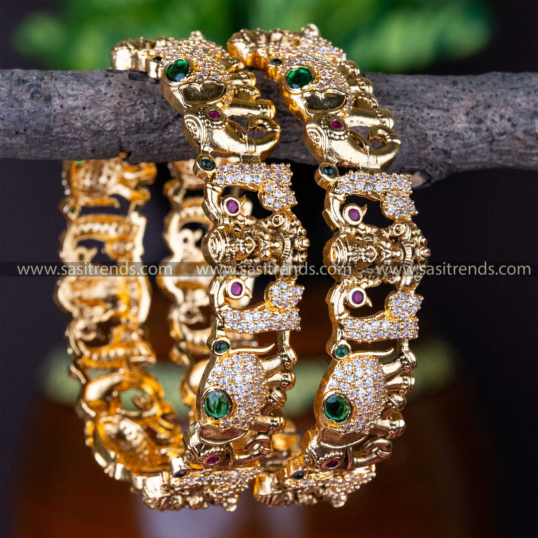 Traditional Matt Gold Plated Lakshmi Motif AD Stones Studded Bangles